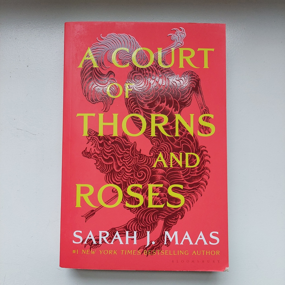 A Court of Thorns and Roses by Sarah J. Maas - Bloomsbury Publishing Company